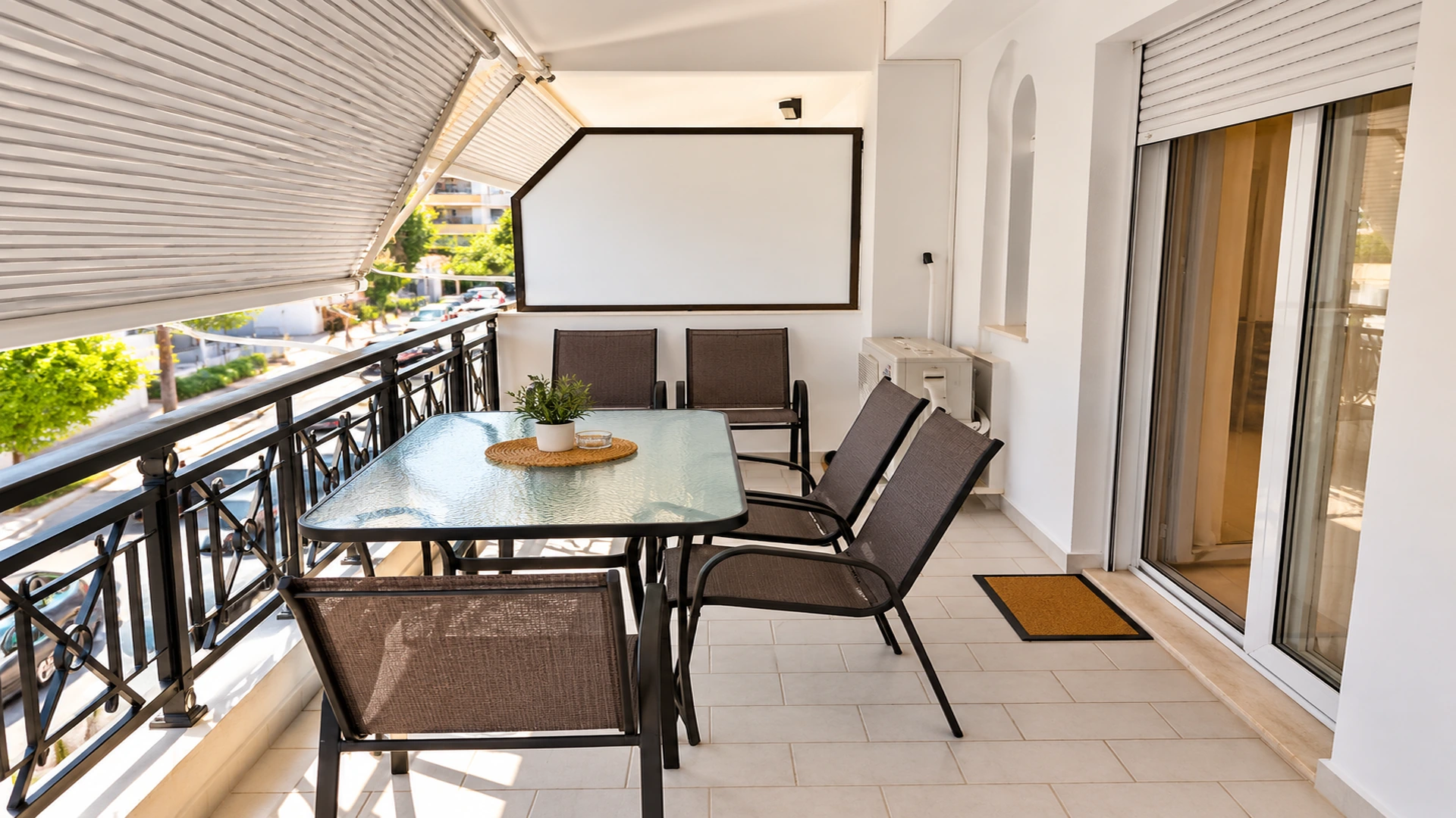 Sunlit outdoor balcony dining space